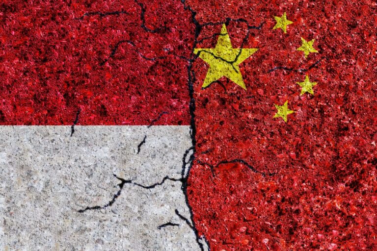 China,And,Indonesia,Painted,Flags,On,A,Wall,With,Grunge