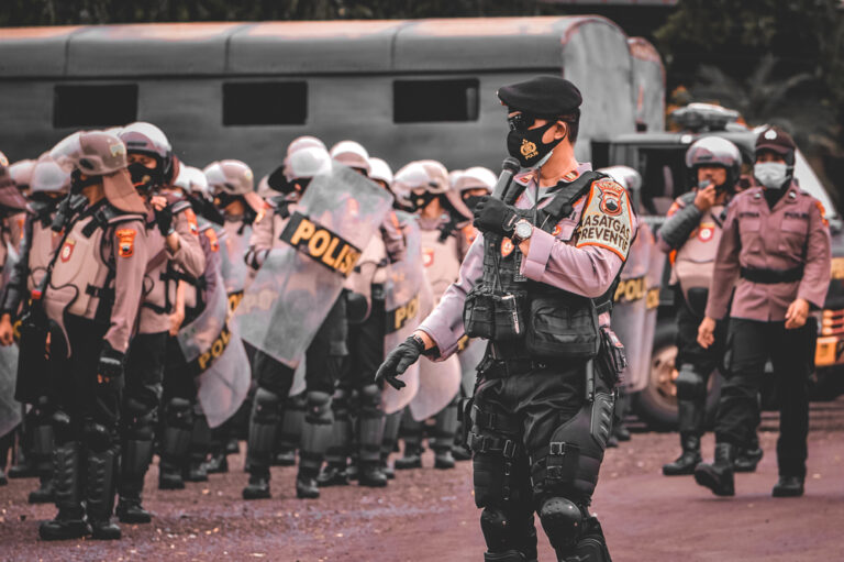 An,Indonesian,Police,Commander,Is,Arranging,A,Police,Line,To